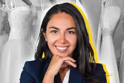 A Latina woman in full color, set against a background showcasing a collection of wedding dresses, evoking a sense of the past.