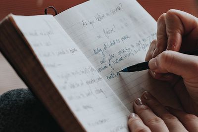 image of a woman journaling