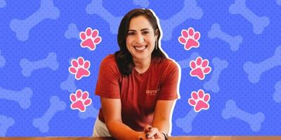 latina woman, Maricela Guerra, in front of a backdrop of paw prints and dog bones