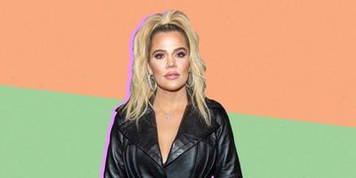 Khloe Kardashian in front of a green and orange background. 