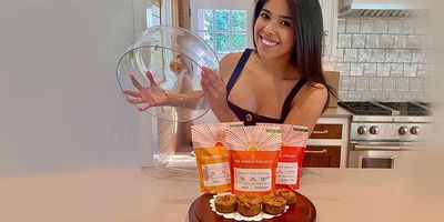 Maya Jazquez smiling with The Pinole Project products. 