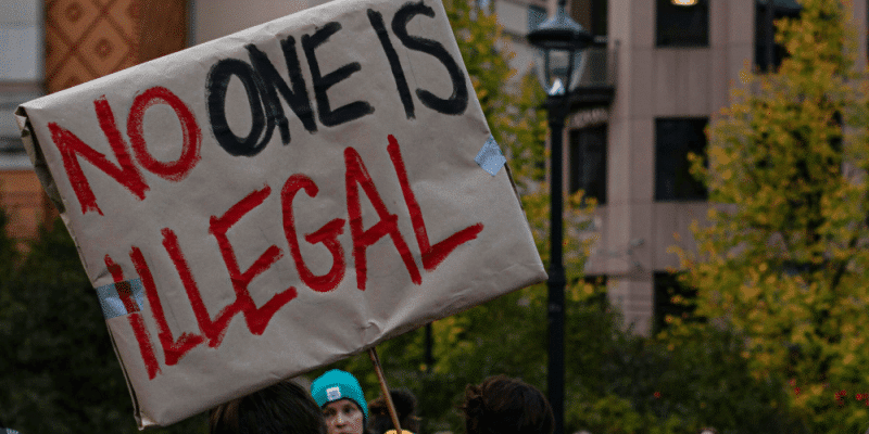 protest sign that reads no one is illegal