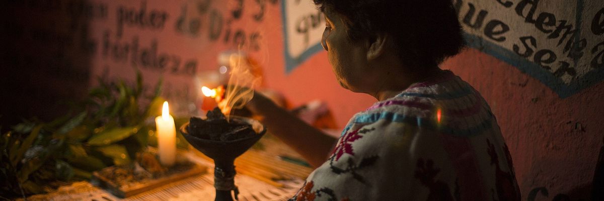 Image of a curandera performing a cleansing ritual in Huautla de Jimu00e9nez