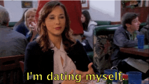 GIF of actress from Parks and Recreation saying "I'm dating myself".