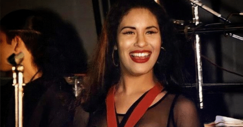 woman with red lips smiling